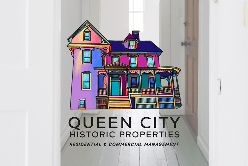 queen city historic properties logo of a colorful house superimposed over the entryway to an apartment